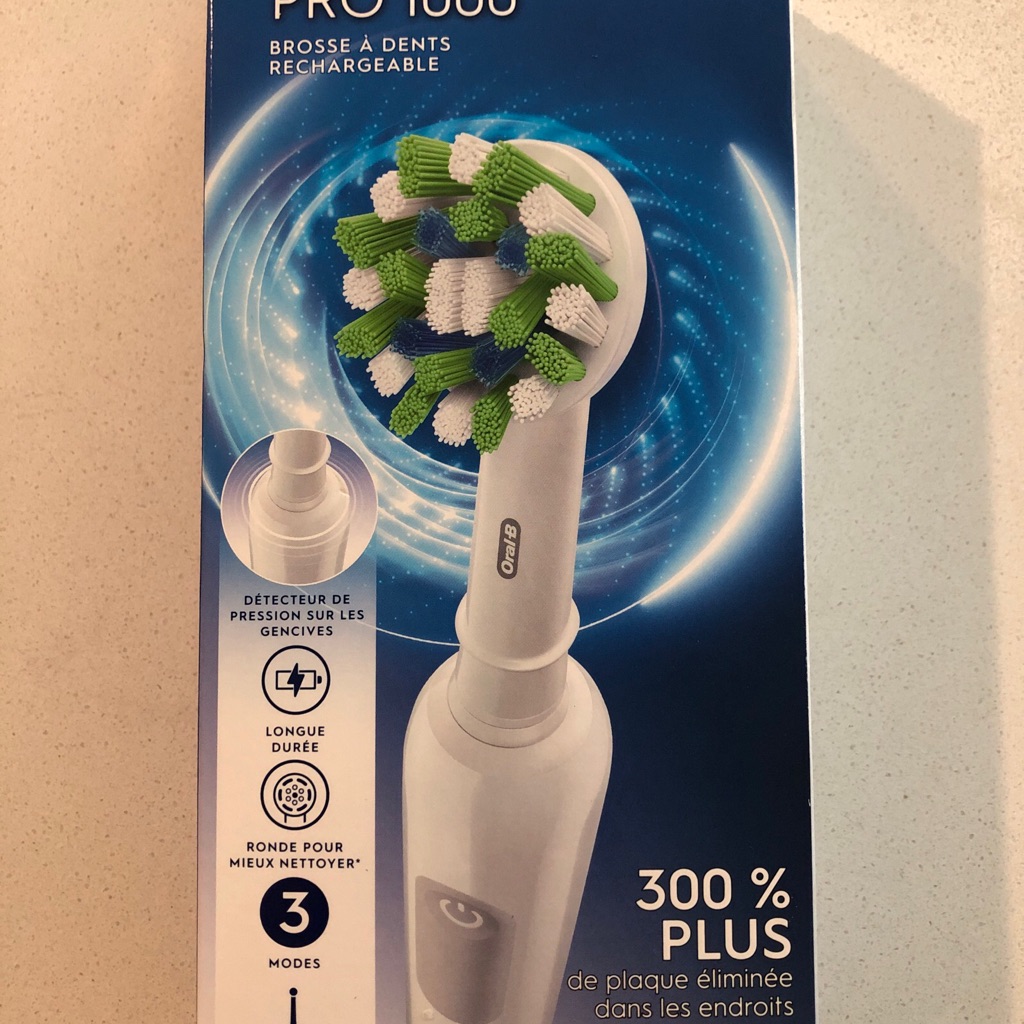Oral-B Pro 1000 Rechargeable Electric Toothbrush With 3d Crossaction White